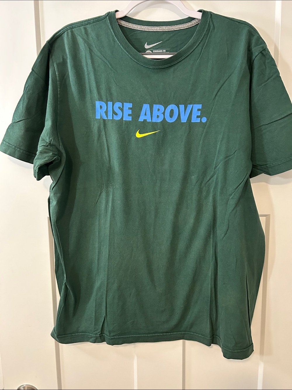 Nike Green 'Rise Above' Short-Sleeve Tee with Blue Text and Yellow Swoosh